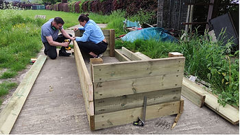 People making a wooden construction