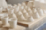 Unpainted ceramic bowls after bisque kiln firing