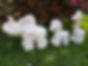 Set of 3 ceramic bisque African animal figures, elephant, zebra and giraffe. Left side view