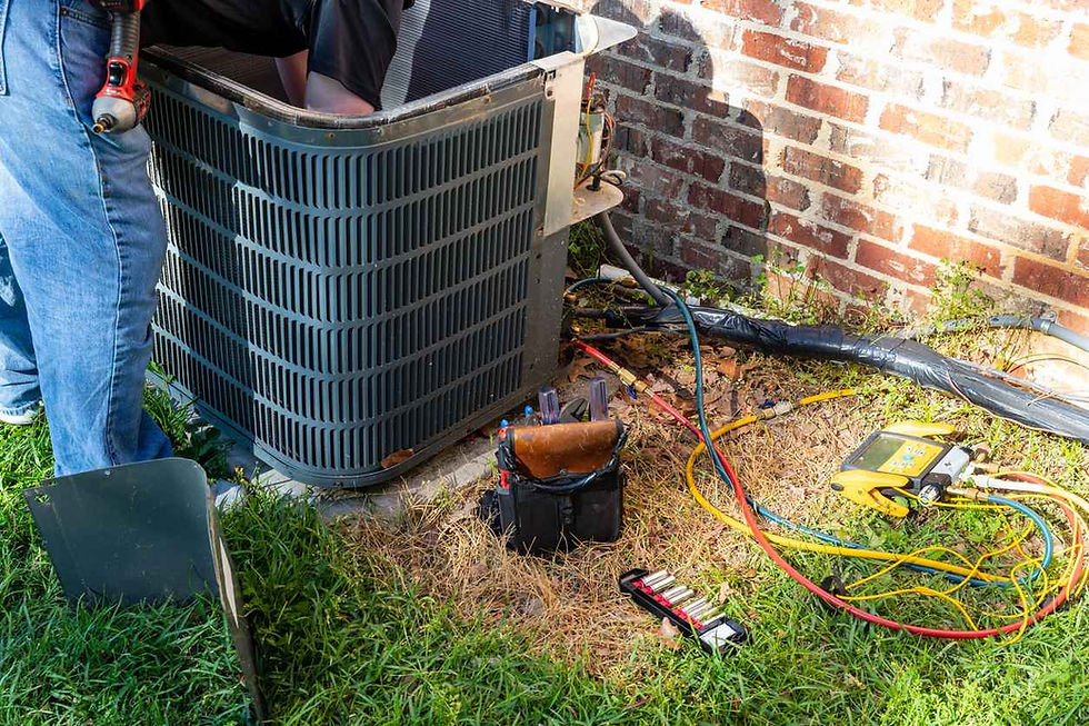 HVAC technician working on an outdoor air conditioning unit; AC system needs repair