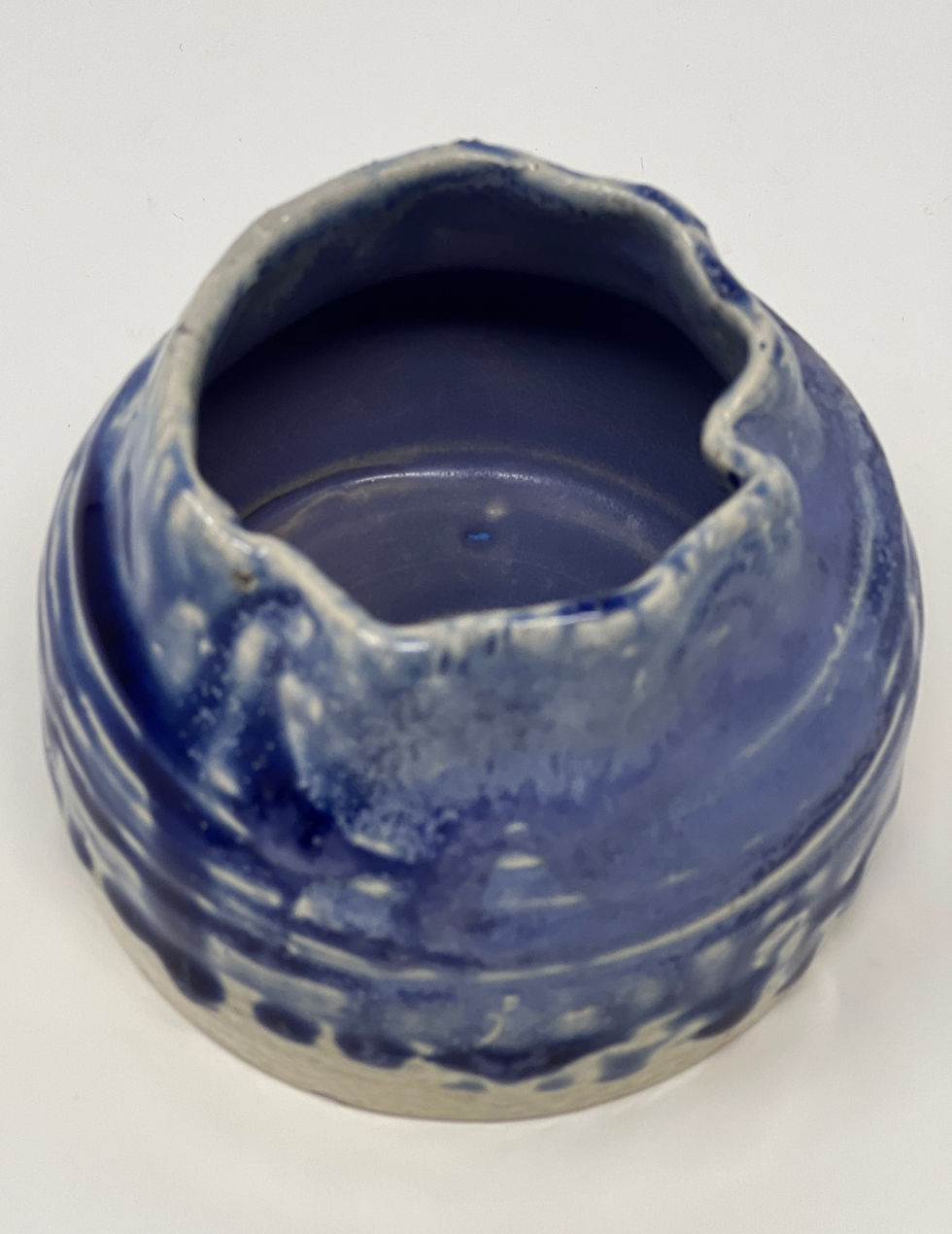 Thumbnail: small cylinder with narrow curved neck in shades of blue