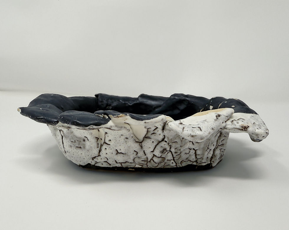 Thumbnail: oval dish with layered clay petals in black and white
