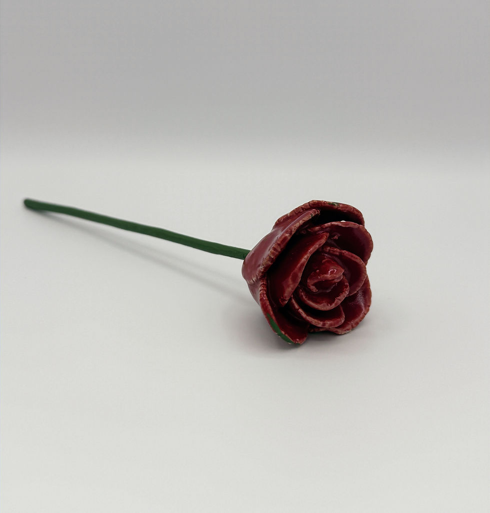 hand built rose in red with green wooden stem