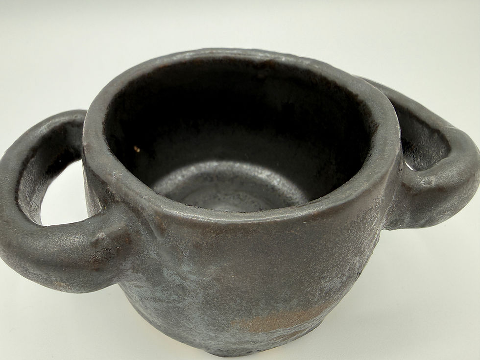 small pot with 2 handles glazed in black
