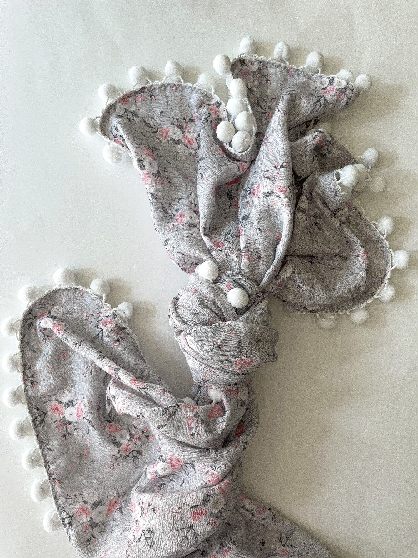 Floral pom pom blanket