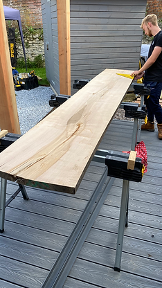 Solid Ash plank being formed to make bar top