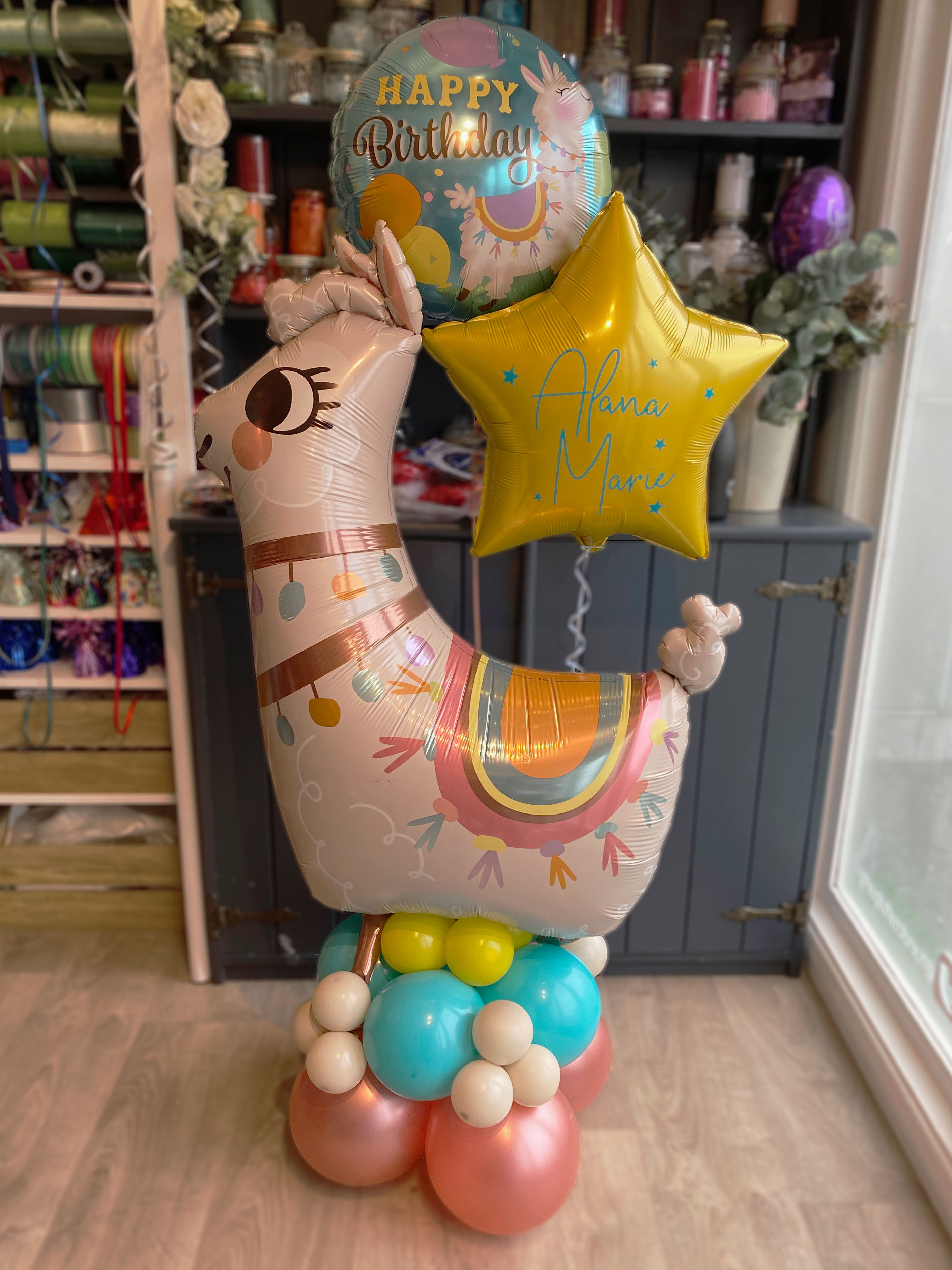 Llama Themed Stack with two floating balloons