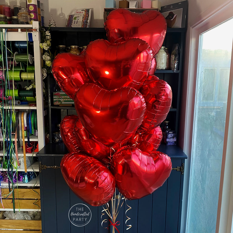 Thumbnail: A Dozen Red Hearts Foil Balloon Bouquet