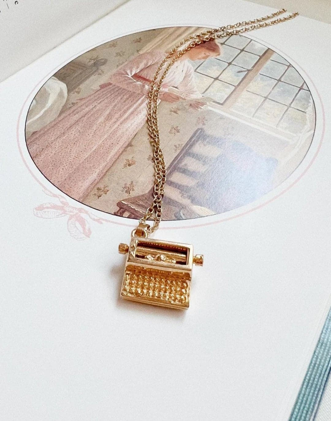 Cadena con dije de maquina de escribir