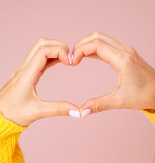 female-hands-gesturing-heart.jpg
