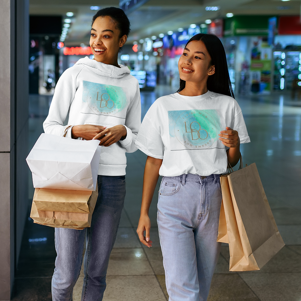 t-shirt-and-hoodie-mockup-of-two-female-friends-shopping-at-a-mall-44401-r-el2.png