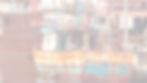 Rusted boat in the water with faded white overlay.