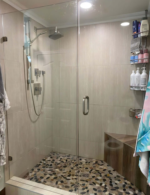 Newly renovated shower with a large space.