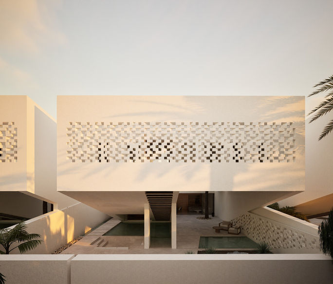 Exterior view of a contemporary white building with a perforated facade and elevated volume at sunset by 9901 Architects.