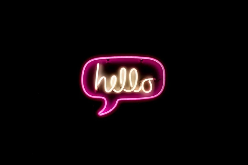 A neon text bubble with the word "hello" in it