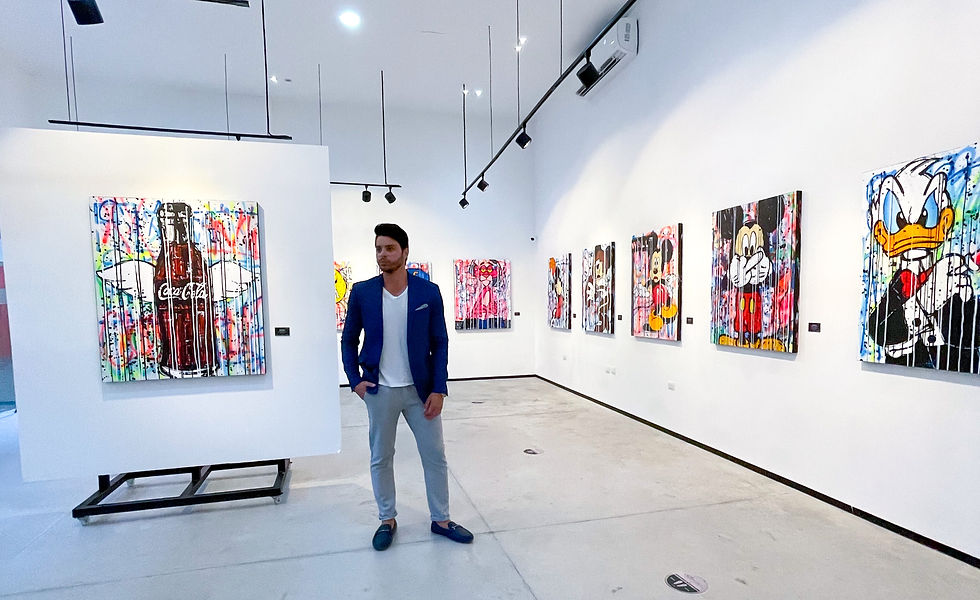 Eye-level view of a contemporary art gallery with mixed media installations