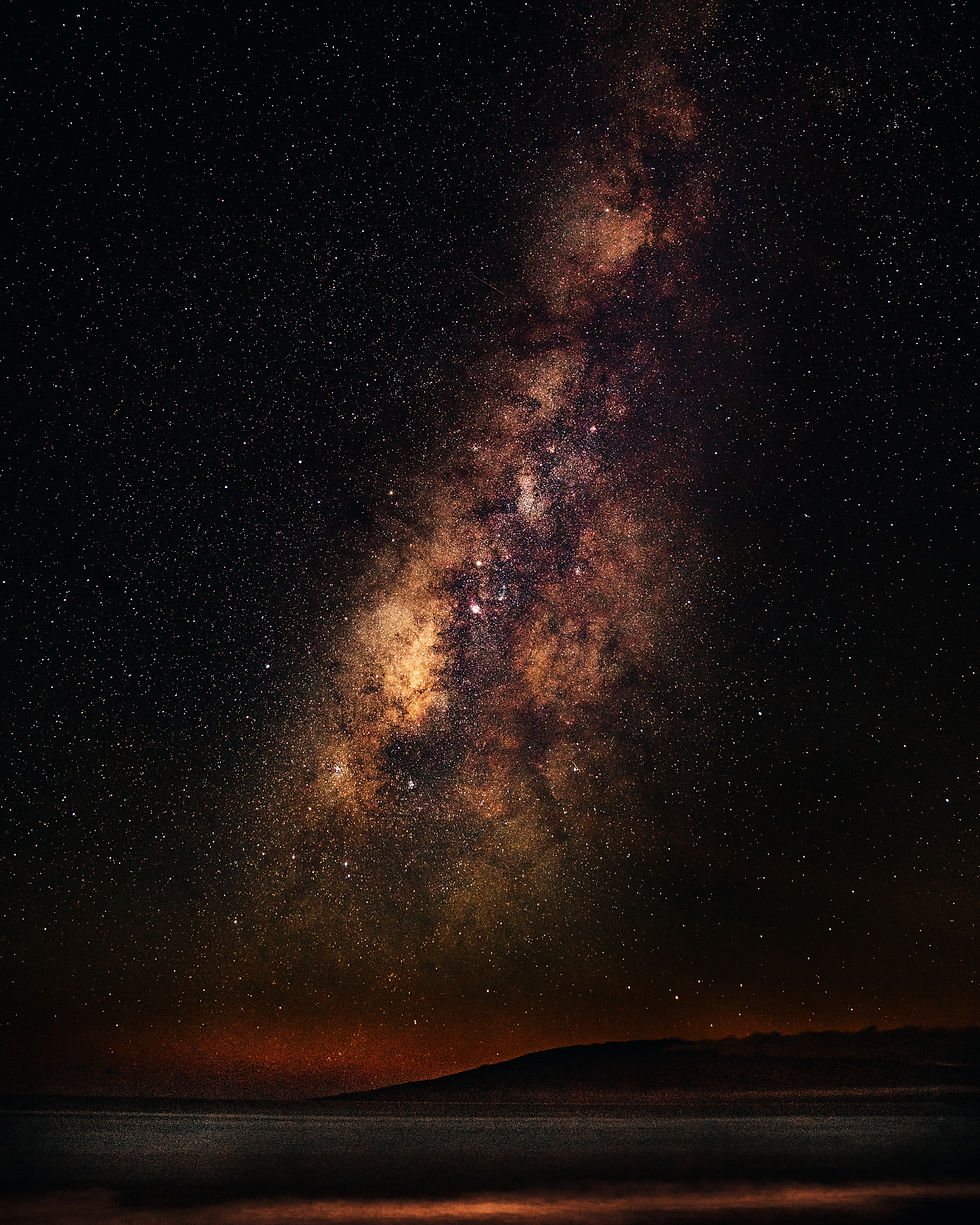 vertical-shot-sea-starry-sky-with-milky-way.jpg