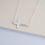 Thumbnail: Sideways Personalized Cross Name Necklace