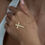 Thumbnail: Engraved Cross Necklace With Birthstone