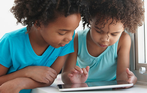 Two Friends with a Tablet