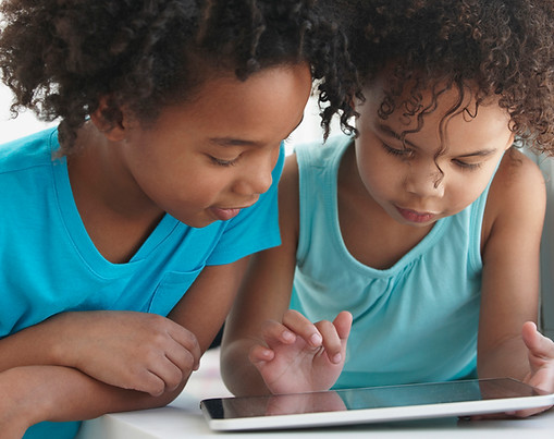 Two Friends with a Tablet