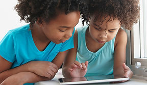 Two Friends with a Tablet