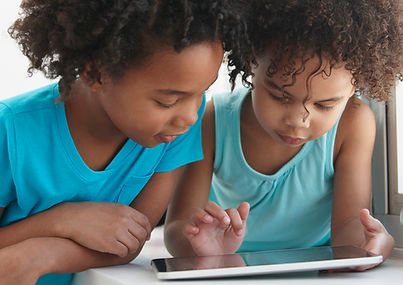 Two Friends with a Tablet