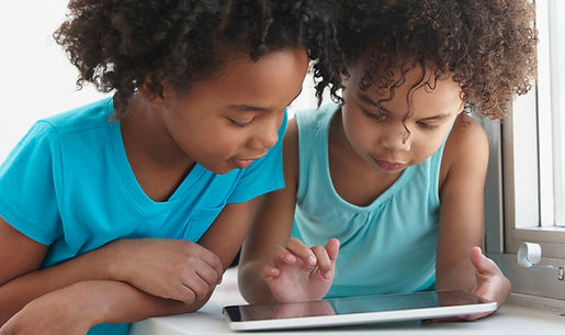 Two Friends with a Tablet