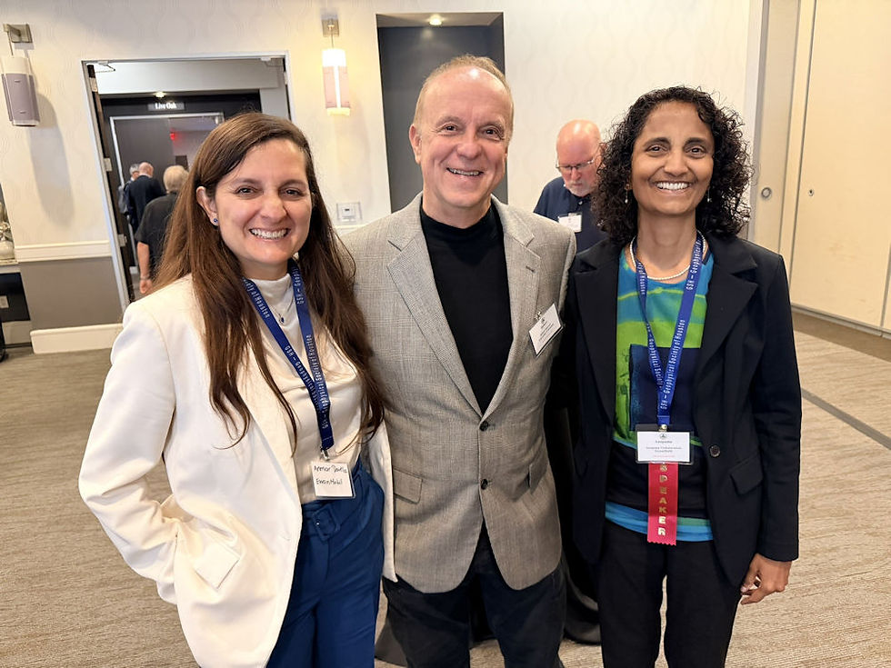 Smiles, colleagues and a legacy worth celebrating: the best kind of symposium photo is also a friendship photo.