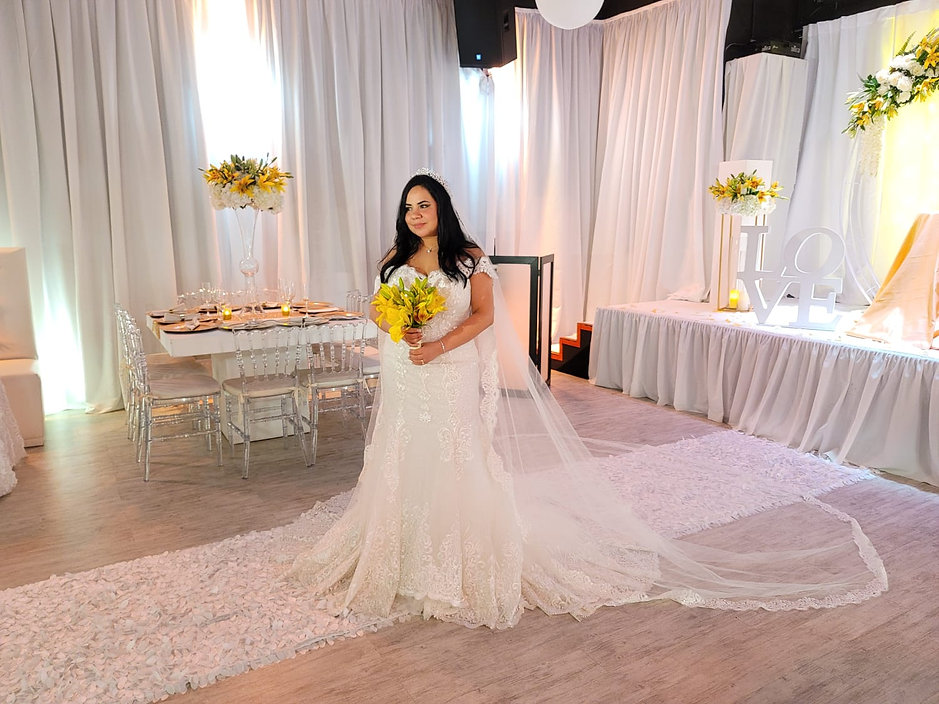 bride holding bouquet in wedding hall