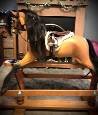 Repainted rocking horse by Vicky Tucker.