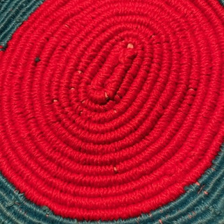Details of bottom view of hand coiled vessel