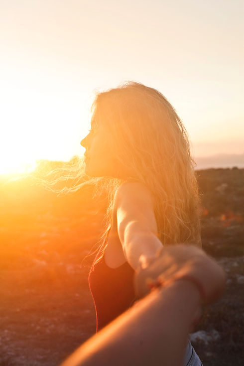 Canva - Photo of a Woman at Sunset.jpg