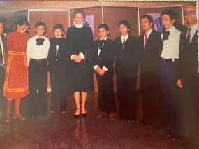 2. Assurhadoun with Farrah Pahlavi (1974) and his music students.jpg
