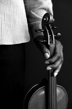Holding a Violin_edited.jpg