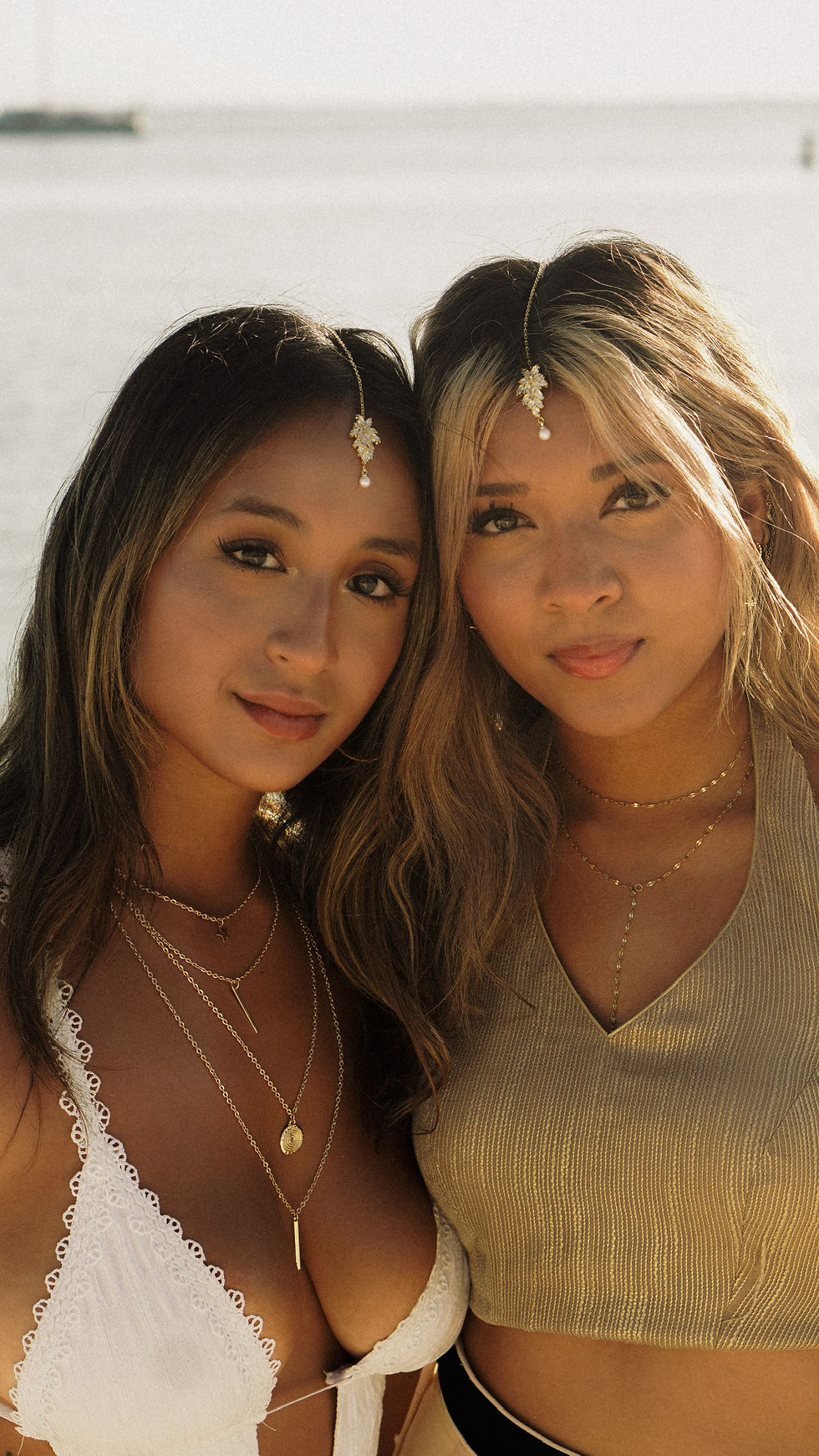 Haley Atallah (left) and Khushi Vyas (right) posing in their first shoot as co-founders of Amoura Jewelers.