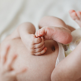 Four month old baby girl milestone session photography by Tiffany Edwards In home Billings Mt