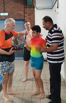Andrew receives the Taylor Trophy for Progress 2022-2023.jpg