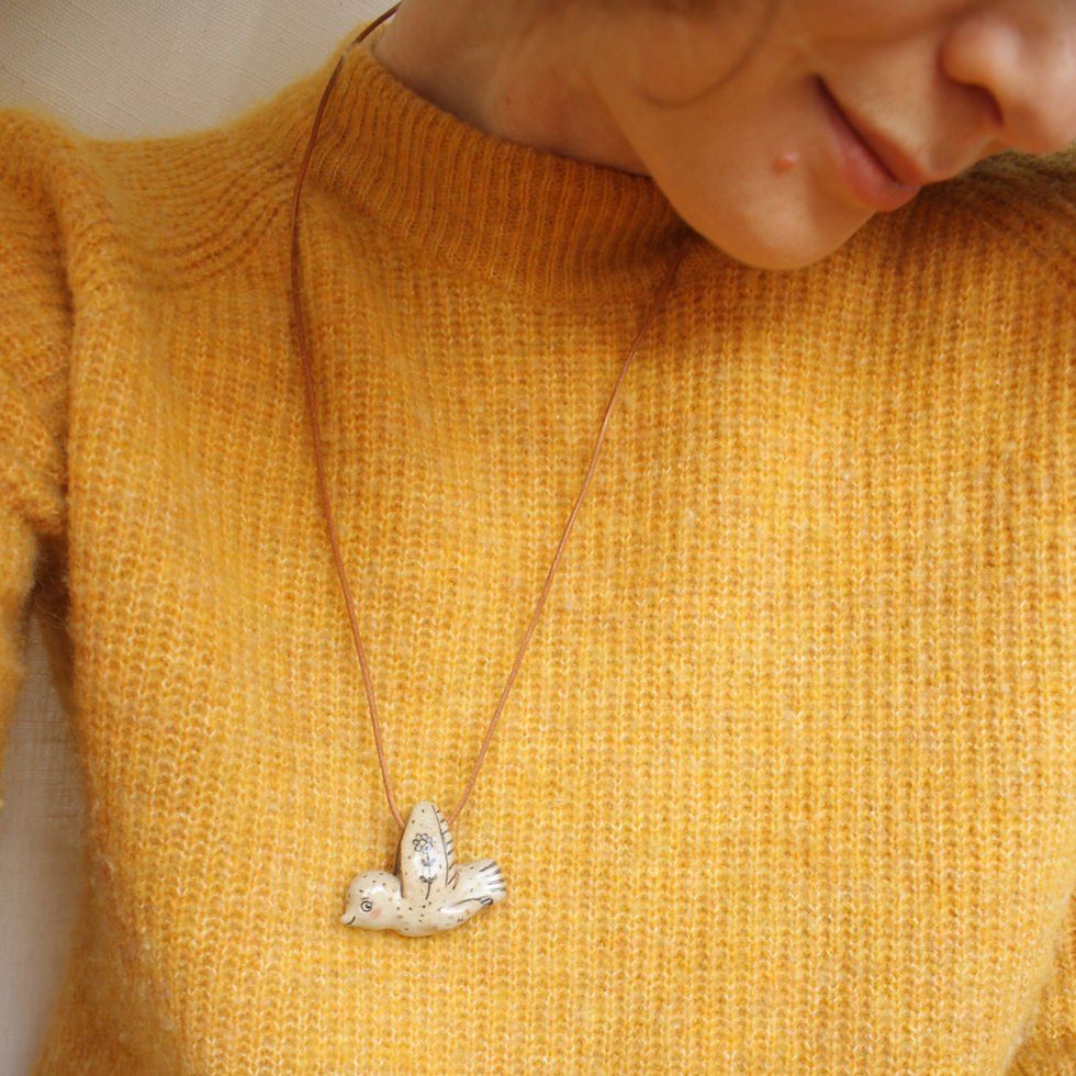 Thumbnail: Curious bird pendant