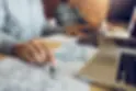 software-developer-is-pointing-to-the-paper-workin-2023-11-27-05-16-34-utc.webp