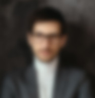 portrait-young-confident-businessman-wearing-glasses copia.jpg