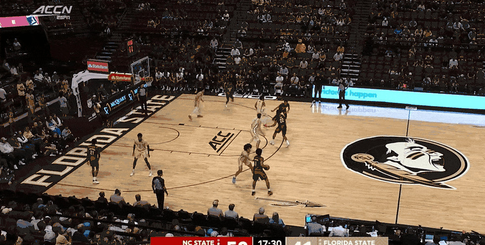 Florida State soft hedges the ball screen and attempts to switch the back screen. They don't communicate the switch well. The switch onto Williams eliminates the post up, but the switch onto McNeil is super late and McNeil's defender ends up way behind him as he lifts to accept the veer screen. The result is an easy shot. 