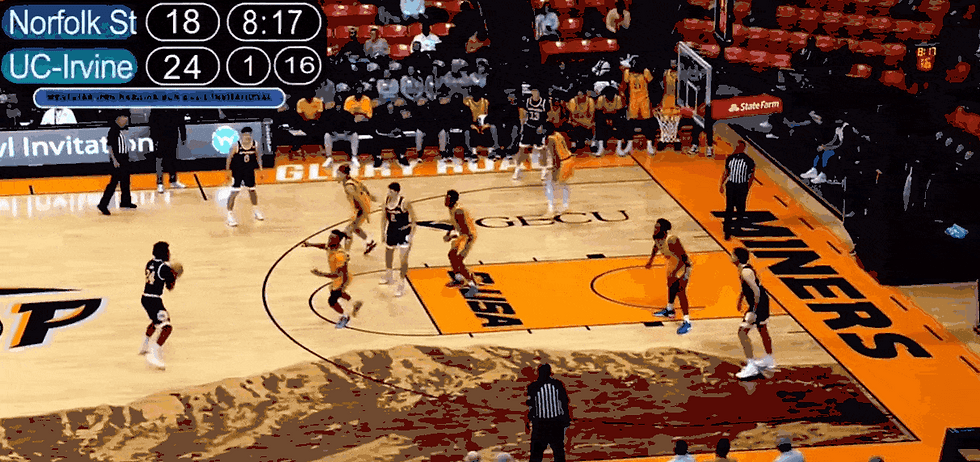 Irvine runs an empty side "get" action. Evans slides to the open space and floats it in off the catch. 