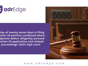 Gavel and block on wooden desk alongside text detailing Delhi High Court ruling on Section 34 petition delay condonation