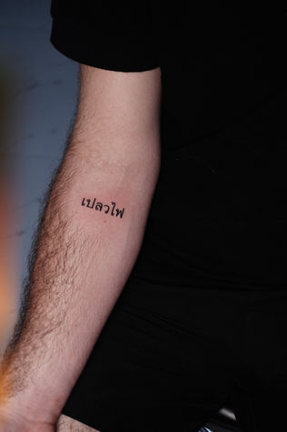 Thai Script Fine Line Tattoo in Da Nang | DN TATTOO