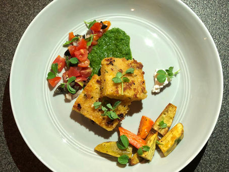 Crispy Polenta with Roasted Vegetables and chimichurri sauce