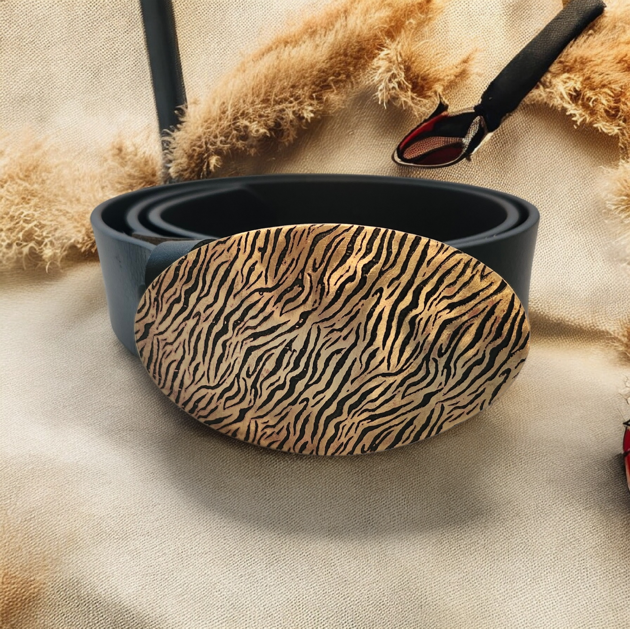 zebra patterned brass belt buckle hand made in texas