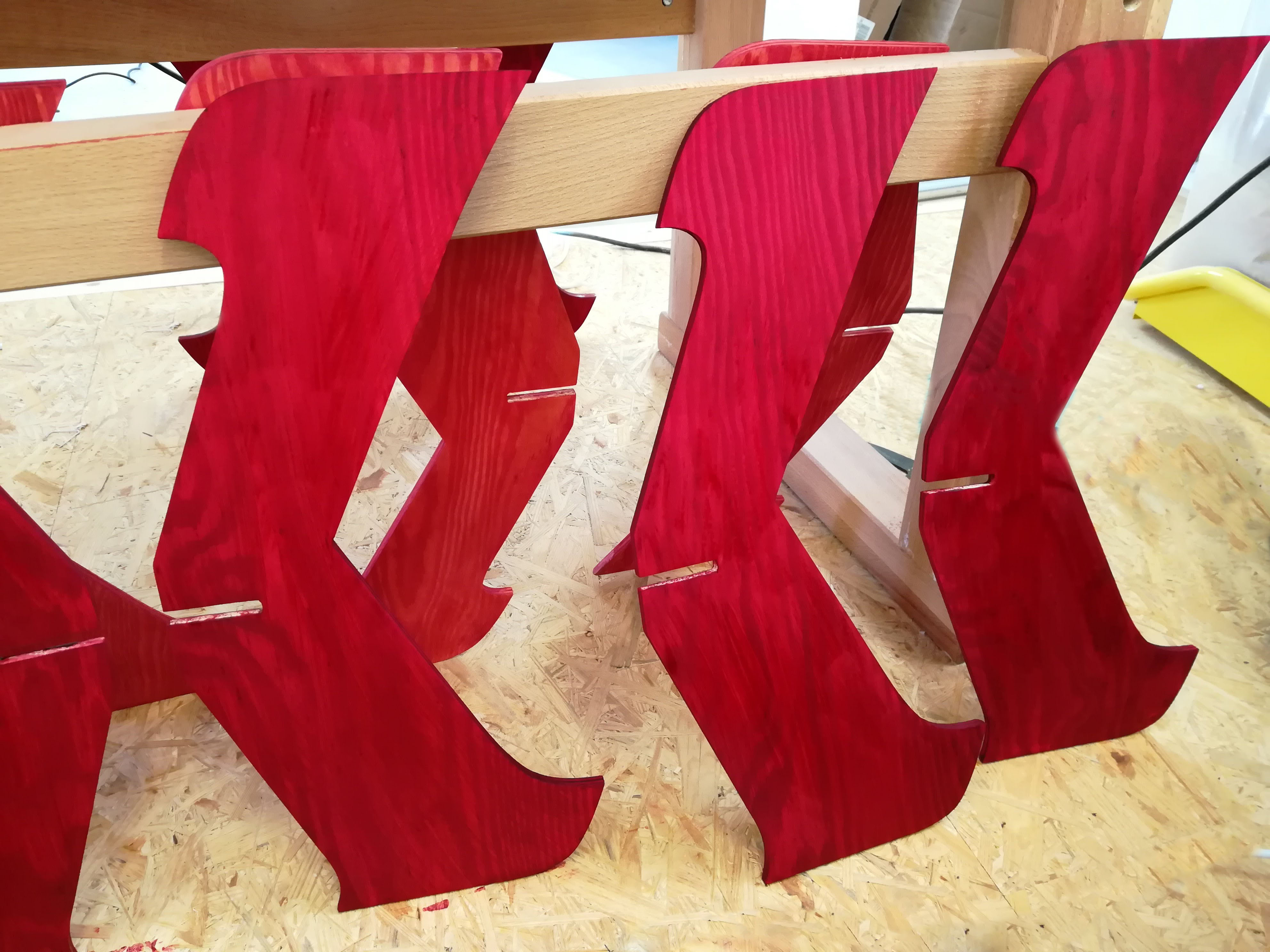 Wooden lamp stained with red dye Czechia
