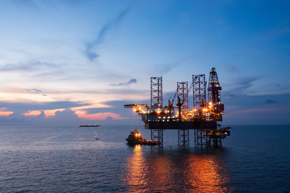 Aerial view of offshore jack up rig and offshore platform during sunset for oil and gas ex
