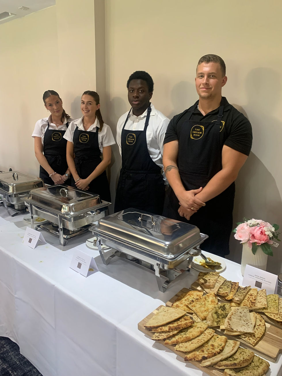 The Indian Dish Buffet with staff